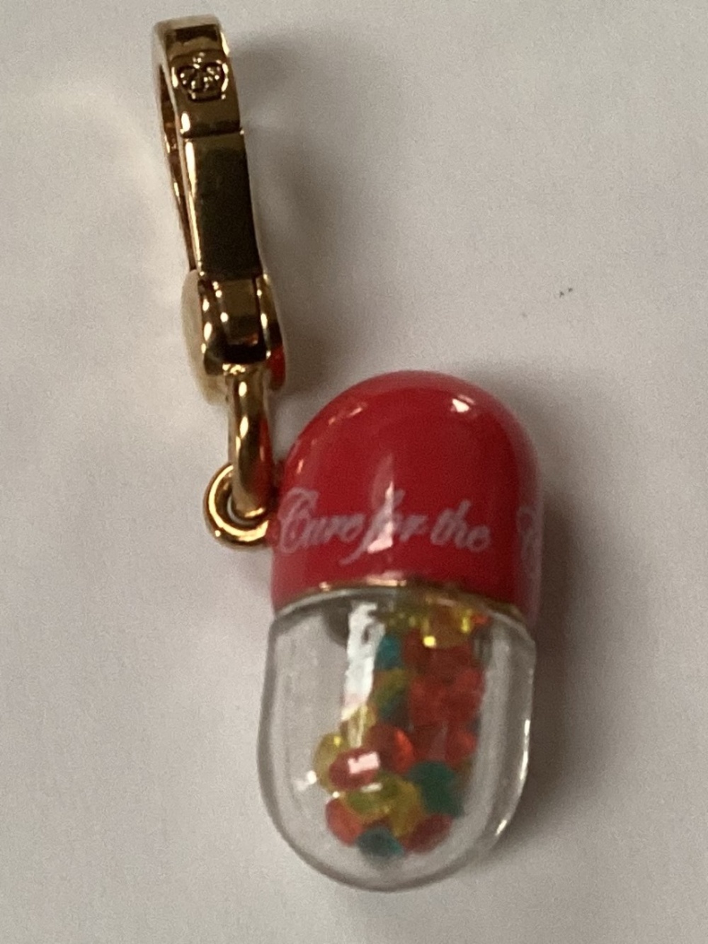 JUICY COUTURE PILL CHARM " CURE FOR THE COMMON COUTURE" 2011